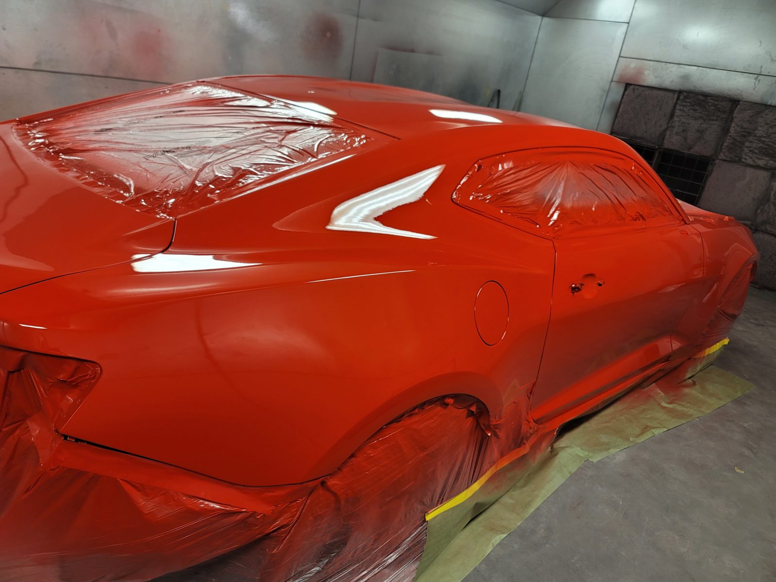 Freshly painted red vehicle, glossy finish